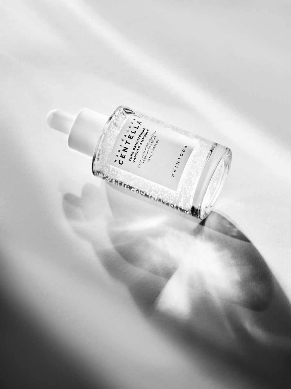 [스킨1004] 마다가스카르 병풀 톤 브라이트닝 캡슐 앰플 50ml